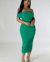 Sincerely Yours Ruched Green Dress side view highlighting midi hemline
