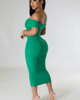 Elegant Green ruched midi dress on model styled for evening