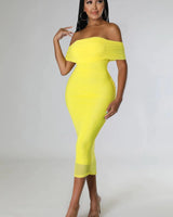 Elegant Yellow ruched midi dress on model styled for evening