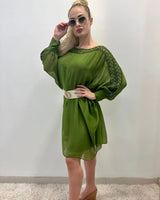 Elegant Lime silk mini dress on model styled for going out