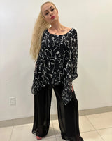 Women's Black long sleeve top elegant style back view