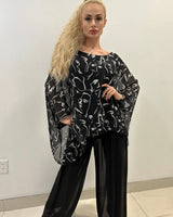 Splendida Silky Italian Black Blouse front view showing long sleeve design
