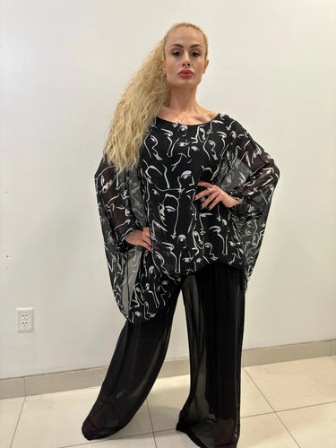 Splendida Silky Italian Black Blouse showing sleeve construction and neckline detail