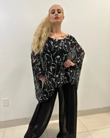 Splendida Silky Italian Black Blouse side view showing fit and silhouette
