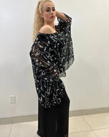 Splendida Silky Italian Black Blouse close up of elegant fabric and sleeve detail
