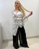 Women's White long sleeve top from Palazzo Couture collection