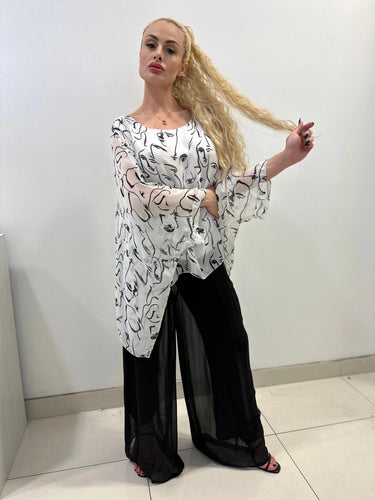 Women's White long sleeve top from Palazzo Couture collection