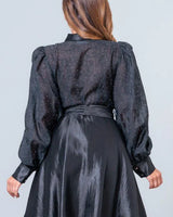 Starlight Elegance Rhinestone Mini Dress in Black showing dress construction and fit details