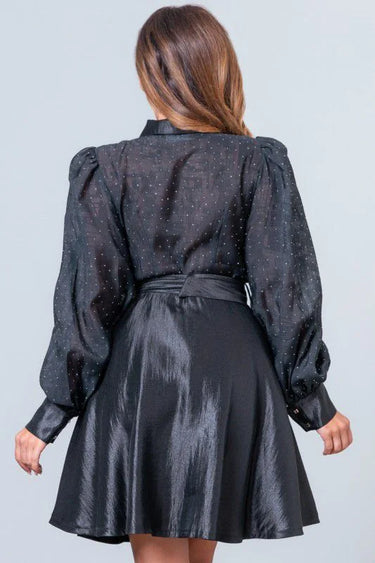 Starlight Elegance Rhinestone Mini Dress in Black showing dress construction and fit details