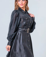 Elegant Black elegant mini dress on model styled for going out