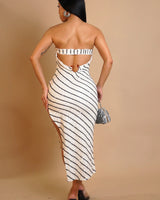 Starlight sequin midi dress showing asymmetrical hem and side slit detail