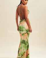 Satin maxi dress featuring gold detail and open back