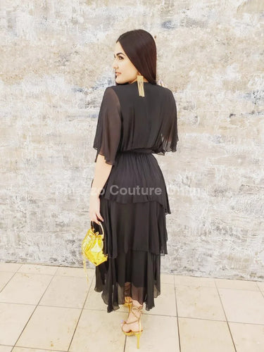 Sweet Thing Italian Maxi Dress (Black) side view highlighting floor-length hemline