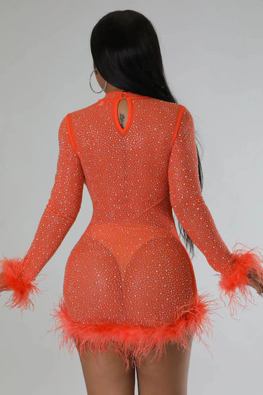 Sweetest Cutie Mini Dress (orange) side view highlighting short hemline