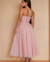 Get ready to turn heads in this pink Sweetheart Corset Midi Dress. Perfect for a special occasion or a fun night out!