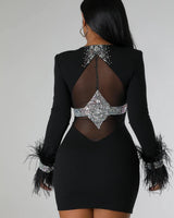 Women's Black mini dress feather style back view