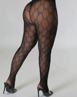 Close-up of GG pattern Fishnet Tights Black showing fine mesh texture and elegant interlocking design.