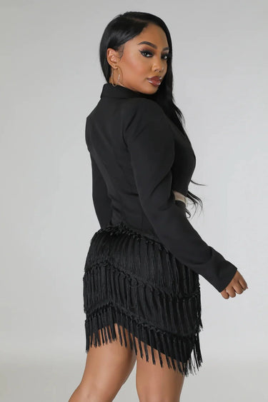 Elegant Black cutout mini dress on model styled for going out