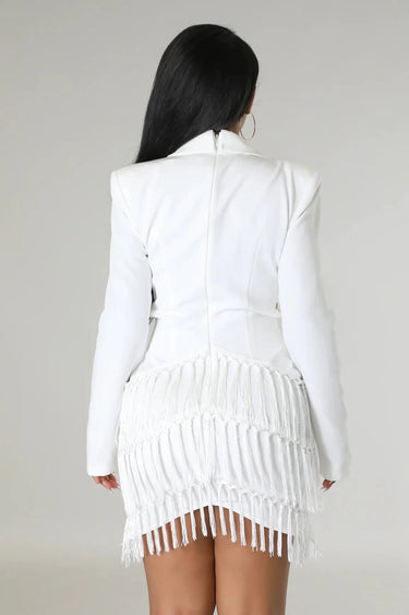 Elegant White long sleeve mini dress on model styled for going out