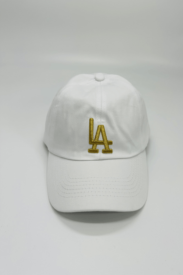 White baseball cap front view featuring gold embroidery