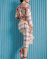 High-waisted plaid skirt with floral accents and front slit