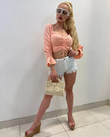 Women's  long sleeve top crop top style back view