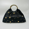 Black woven straw tote bag with gold accents and circular handles