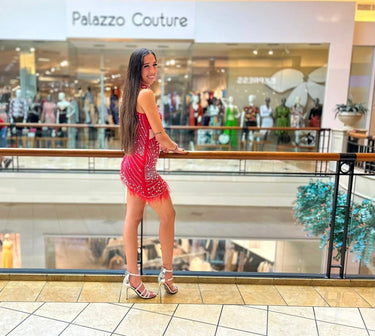 Elegant Red elegant mini dress on model styled for going out