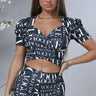Vogue Print Black Crop Top with Puff Sleeves for women - crop top by Palazzo Couture