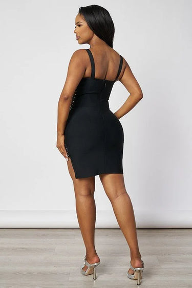 Elegant Black elegant mini dress on model styled for going out