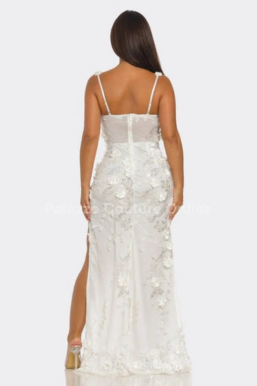 Elegant Enchanted Blossom sequin maxi dress on model styled for evening event