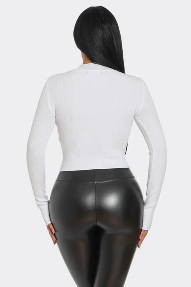 White Heart Cutout Turtleneck Top – Lovely Fit showing sleeve construction and neckline detail