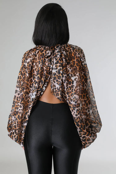 animal print chiffon blouse flat lay
