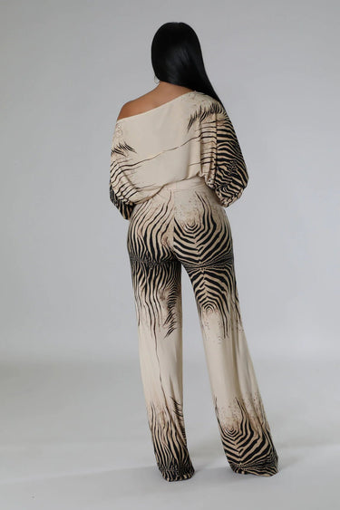 One-piece wide leg jumpsuit with flowing silhouette