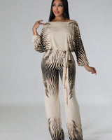 Wide leg jumpsuit with adjustable waist strap