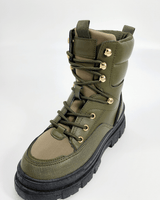Olive green combat boots with lace-up front and thick sole