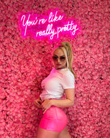 Hot pink shimmer shorts designed for a stylish and bold summer look.