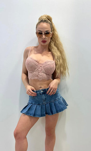 Pink lace crop top made from lightweight fabric