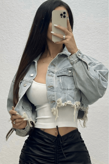 Distressed black denim jacket with graphic of Marylin Monroe