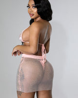 Back view of pink two piece skirt set – tie top and glitter mesh skirt