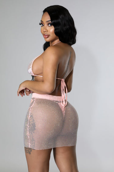 Back view of pink two piece skirt set – tie top and glitter mesh skirt
